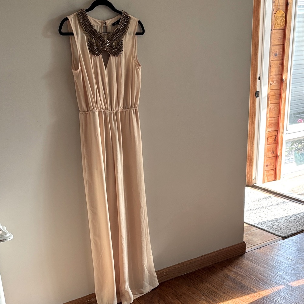 BCBGMaxAzria • cream “Garnet” jumpsuit with embellished neckline